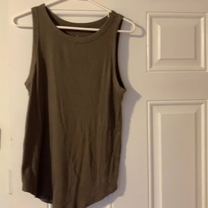 Tank Size XL fits true to size color is olive